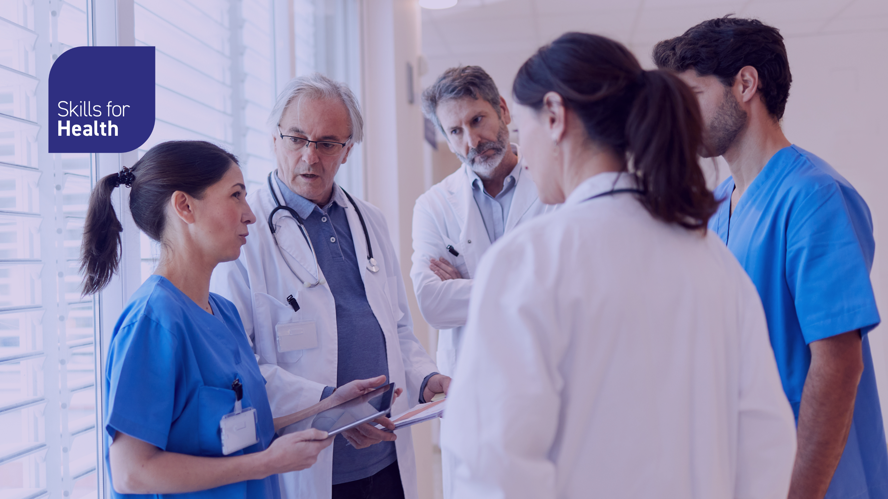 Several medical care workers in discussion