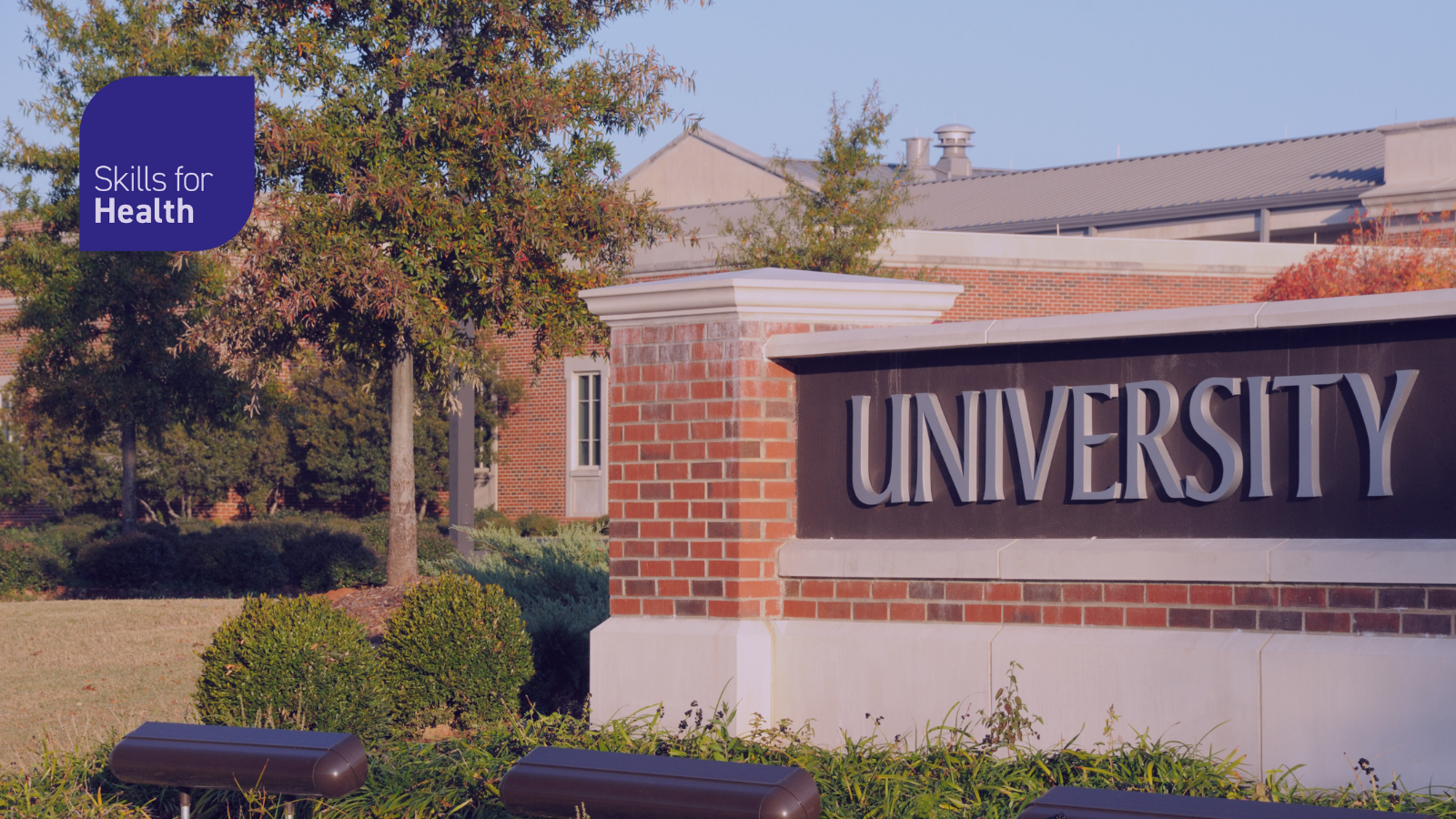 Wall outside with the word "University"